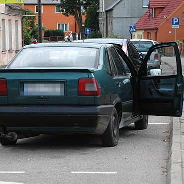 Grat zajmuje miejsce parkingowe